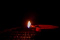 Lighting of diya commonly done during the Indian festivals. Karthigai deepam festival of lights celebrated in south india Royalty Free Stock Photo