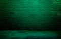 lighting effect green on empty brick wall background for design. dark black brick wall background, rough concrete. Royalty Free Stock Photo