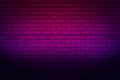 Lighting effect neon light on brick wall texture for background