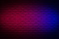 Lighting effect neon light on brick wall texture for background Royalty Free Stock Photo