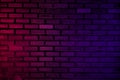 Lighting effect neon light on brick wall texture for party or club bar background decoration Royalty Free Stock Photo