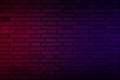 Lighting effect neon light on brick wall texture for party or club bar background decoration Royalty Free Stock Photo