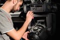 The lighting engineer adjusts the lights on the stage