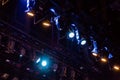 Lighting equipment on the stage of the theater or concert hall. Rays of light from the floodlights Royalty Free Stock Photo