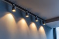 Lighting equipment on the wall in the living room. Spotlights under the ceiling. Track LED-lighting system Royalty Free Stock Photo