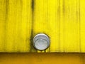 Lighting fixture on weathered plaster yellow wall Royalty Free Stock Photo