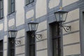 Lighting lanterns on the wall of a building Royalty Free Stock Photo