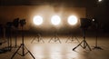 Lighting setup in a dark studio with smoke effects creating dramatic atmosphere for a shoot Royalty Free Stock Photo