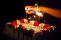 Lighting sparkles on a birthday cake Royalty Free Stock Photo