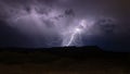 Lighting spreads from dark clouds like roots from a tree Royalty Free Stock Photo