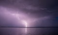 Lighting strike over water Royalty Free Stock Photo