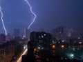 Lightning strike thunderstorm weather over night city Royalty Free Stock Photo