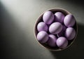 Lightly colored purple easter eggs in a bowl Royalty Free Stock Photo