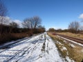 Railway line with light dusting of snow at the side