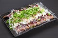 Lightly roasted bonito sashimi with onion