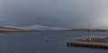 The lightly snow covered Mark of Bressay with its tall communication towers overlooking the town of Lerwick.