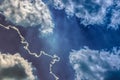 Lightning amid a dark blue sky. Cumulus clouds. Royalty Free Stock Photo