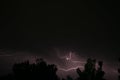 Lightning bolt at a dark night. Long lightning bolt. Royalty Free Stock Photo