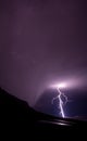 Lightning bolt in rural mountains Royalty Free Stock Photo