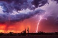 Lightning bolt strike in a storm at sunset Royalty Free Stock Photo