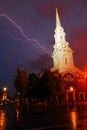 A lightning bolt strikes a historic church