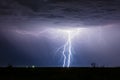 Lightning bolt strikes in a thunderstorm Royalty Free Stock Photo