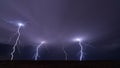 Lightning bolt strikes from a thunderstorm Royalty Free Stock Photo