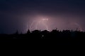 Lightning bolt striking in the sky from clouds Royalty Free Stock Photo