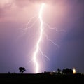 Lightning bolt at strom over village Royalty Free Stock Photo