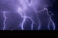 Lightning bolts strike from a storm Royalty Free Stock Photo