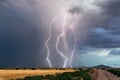 Lightning bolts strike from a thunderstorm in Arizona Royalty Free Stock Photo