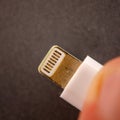 Lightning cable connector for charging Apple iPhone Royalty Free Stock Photo