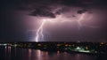 lightning in the city power and beauty nature purple dark clouds and a spectacular lightning storm that illuminates the city below Royalty Free Stock Photo