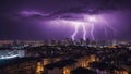 lightning in the city A spectacular display of purple lightning over a city at night. The city lights are dimmed Royalty Free Stock Photo