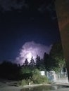 Lightning clouds night trees storm