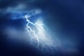 Lightning in dark cloudy sky during thunderstorm Royalty Free Stock Photo