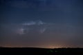 Lightning flashes in a sky during a strong