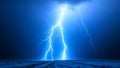 Lightning is a massive electrical discharge caused by imbalances between storm clouds and the ground.Â  Royalty Free Stock Photo