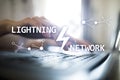 Lightning network - second layer payment protocol that operates on top of a blockchain. Bitcoin, internet payment. Royalty Free Stock Photo