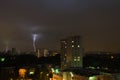 Lightning in night sky in town