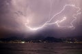 Lightning over the mountains and lake Royalty Free Stock Photo