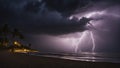 lightning over the sea A dramatic scene of a thunderstorm and lightning over the beach, creating a contrast of light