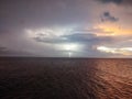 Lightning over the sea on a summer evening