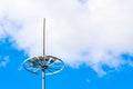 Lightning rod on the lighting pole. Protecting from lightning strikes during a thunderstorm. Safe urban environment Royalty Free Stock Photo