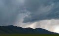 Lightning shoots out from thunder storm clouds over Idaho plains Royalty Free Stock Photo