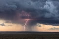 Lightning and storm clouds at sunset Royalty Free Stock Photo