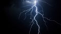 Lightning in storm at night, electric flash of thunder on dark blue sky background. Concept of thunderbolt, thunderstorm, strike, Royalty Free Stock Photo