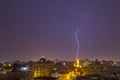 Lightning storm over city in purple light in jeddah al marwah Royalty Free Stock Photo