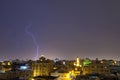 Lightning storm over city in purple light in jeddah al marwah Royalty Free Stock Photo