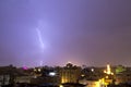 Lightning storm over city in purple light in jeddah al marwah Royalty Free Stock Photo